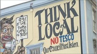 Sign painted on building in Stokes Croft