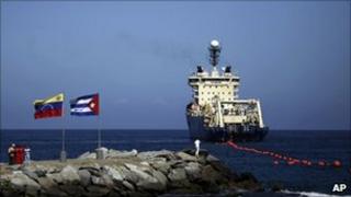 Ship laying undersea fibre-optics cable