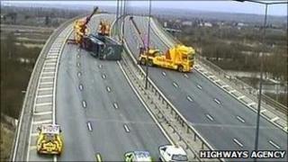 Overturned lorry on M60