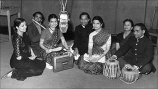 Picture shows Roshan, Shirin and Khurshid Vajifdar (foreground), three sisters who gave a song recital in the BBC Hindi Service to India; with them are (l-r) Sushil Das Gupta (flute), Krishna Kutty, S. Khanna, compere of the programme and Krishna Pennikar (tabla). 1952