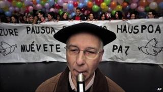 A Basque musician plays the Txistu, a typical Basque instrument, at a rally for peace in Bilbao on 29 January 2011