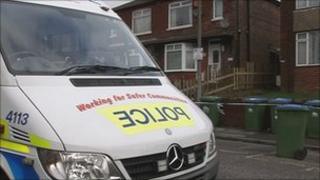 A police van outside the house in Broadlands Road