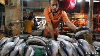 A vendor selling fish in Manila