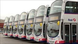 Row of First Group buses