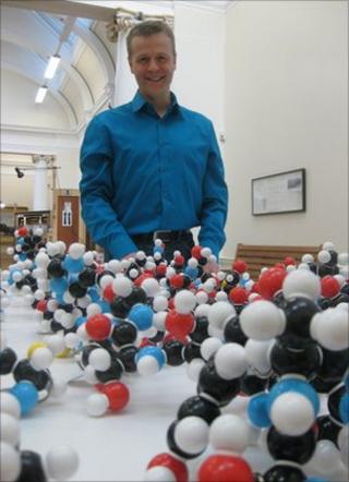 Poet Christian Bok with genetic model