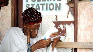 An elderly Nigerian man casts his ballot in the Ketu district of Lagos. Photo by Pius Utomi Ekpei/AFP/Getty Images