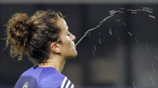 Footballer spits