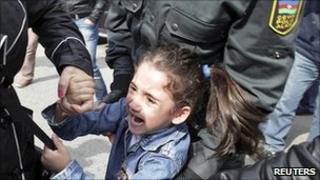 Girl taken away in Baku after shouting "freedom". File photo