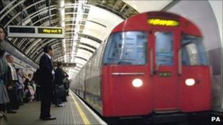 Passengers at a Tube station