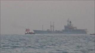 Lifeboats and the RFA Gold Rover carry out a night search for the missing diver