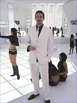Howard Johnson in white suit on set