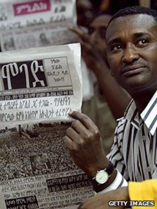 Newspaper reader