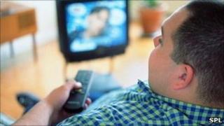 man watching TV