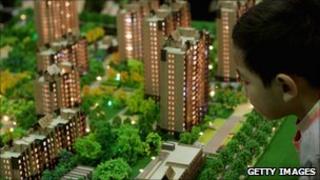 Consumer looking at property model