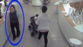 CCTV image of woman