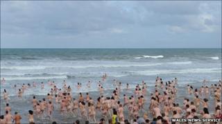 Mass skinny dip at Rhossili on Gower