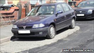 New road laid around car, courtesy Jane Redfern Jones