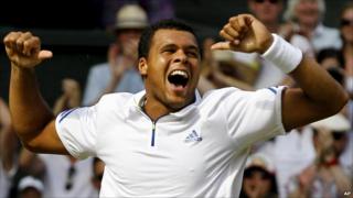 Jo-Wilfried Tsonga celebrates beating Roger Federer at Wimbledon