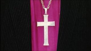 Cross and clothing of Church of England bishop