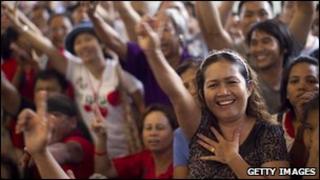 Supporters of Yingluck Shinawatra celebrate her victory