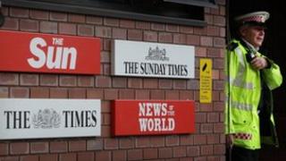 Signs outside News International