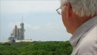 David Le Conte with the space shuttle launchpad in the background