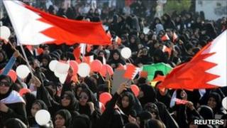 Thousands of anti-government female protesters shout anti-government slogans during a gathering held in the village of Bilad al-Qadeem, south of Manama, by opposition party al-Wifaq, 15 July 2011