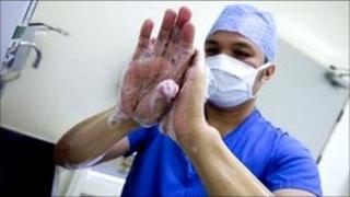 Doctor scrubing up for operation
