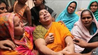 Relatives of six students killed by a mob in July 2011