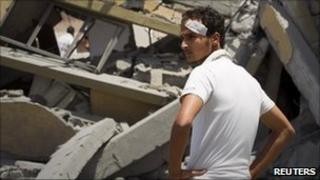 A bombed house in Zlitan, 4 August