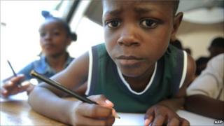 Haitian school child looking a bit perplexed