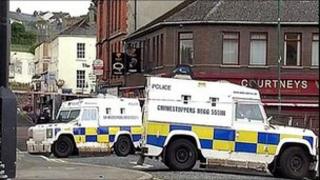 PSNI Land rovers at crime scene