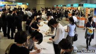 Applicants at a jobs fair in Hong Kong