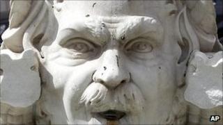 Vandalised marble statue on a fountain in the Piazza Navona