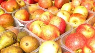 Apples and pears on sale in market