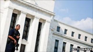 A police officer guarding the Federal Reserve building in Washington.