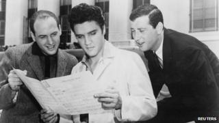 Elvis Presley (C) at MGM studios in Culver City, California in 1957