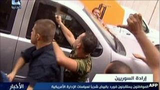 Syrian regime loyalists attack the car of US ambassador Robert Ford (29 September 2011)