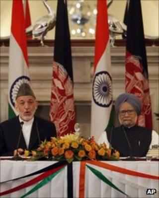 File picture President Hamid Karzai (left) and Indian PM Manmohan Singh