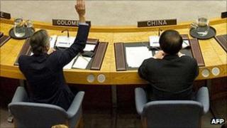 Colombia's ambassador to the UN votes in favour of a proposed resolution on the Syria crackdown, at UN headquarters in New York on Tuesday, next to China's envoy who later vetoed it