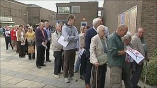 People queuing for the meeting at Swindon's Wyvern Theatre