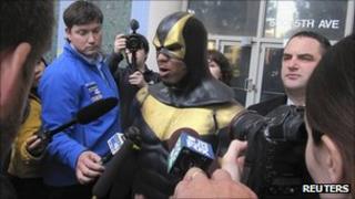 Phoenix Jones, aka Ben Fodor, speaks with reporters 13 October 2011
