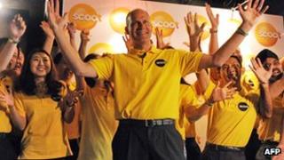Scoot chief executive Campbell Wilson with staff members