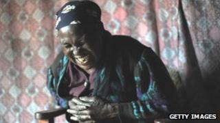 Laughing Kenyan woman