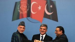 Turkish President Abdullah Gul (centre), his Pakistani counterpart Asif Ali Zardari (right) and Afghan President Hamid Karzai
