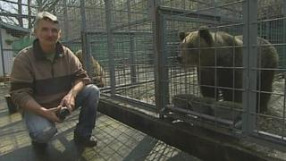 Pavel Pasko and rescued bear Uske