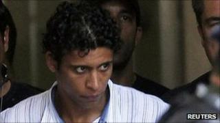 Antonio Francisco Bonfim Lopes escorted by police after his arrest in November 2011