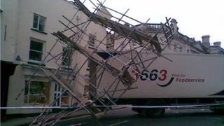 Scaffolding resting on the back of the lorry