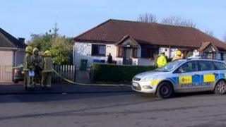 Fire fighters and police officers at the scene
