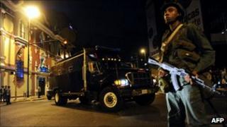 A Venezuelan soldier stands guard as the gold convoy arrives at the Central Bank in Caracas
